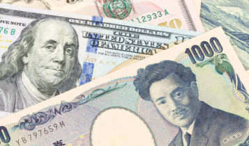 Dollar and Yen Paper bills